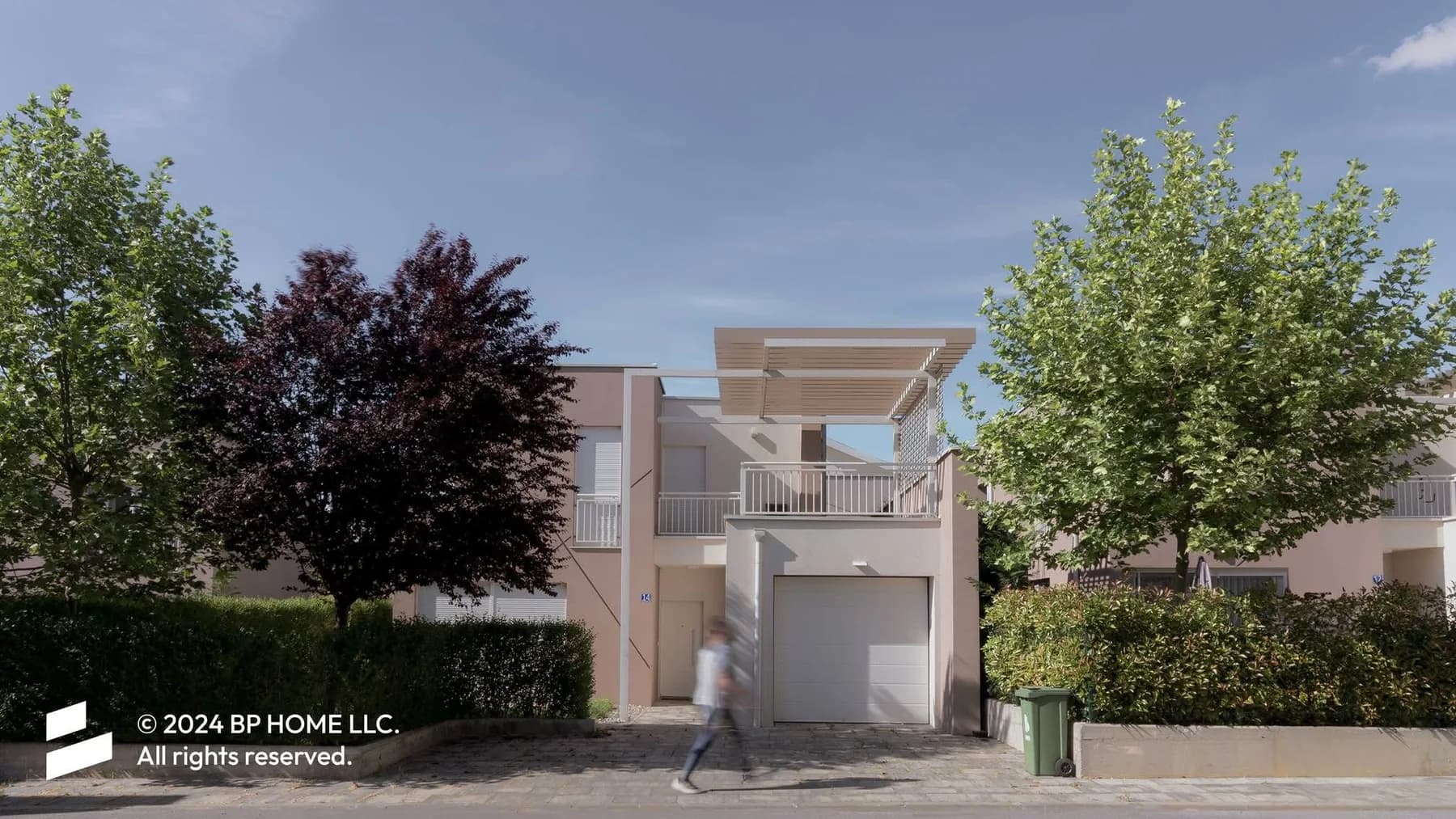 A home and terrace framed by mature trees