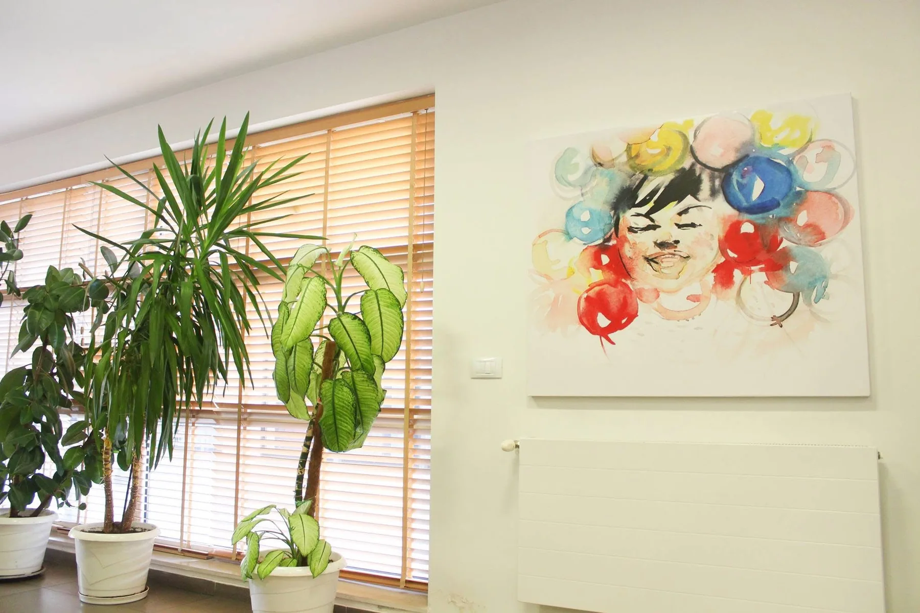 Plants and artwork inside the office